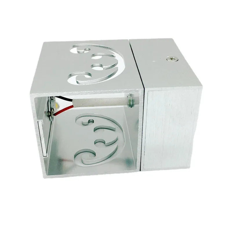 Modern aluminium LED butterfly wall lamp with remote control showing colour changing functionality