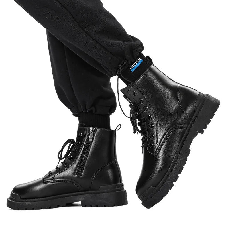 Men's black waterproof leather work boots with rubber sole and mid-top design
