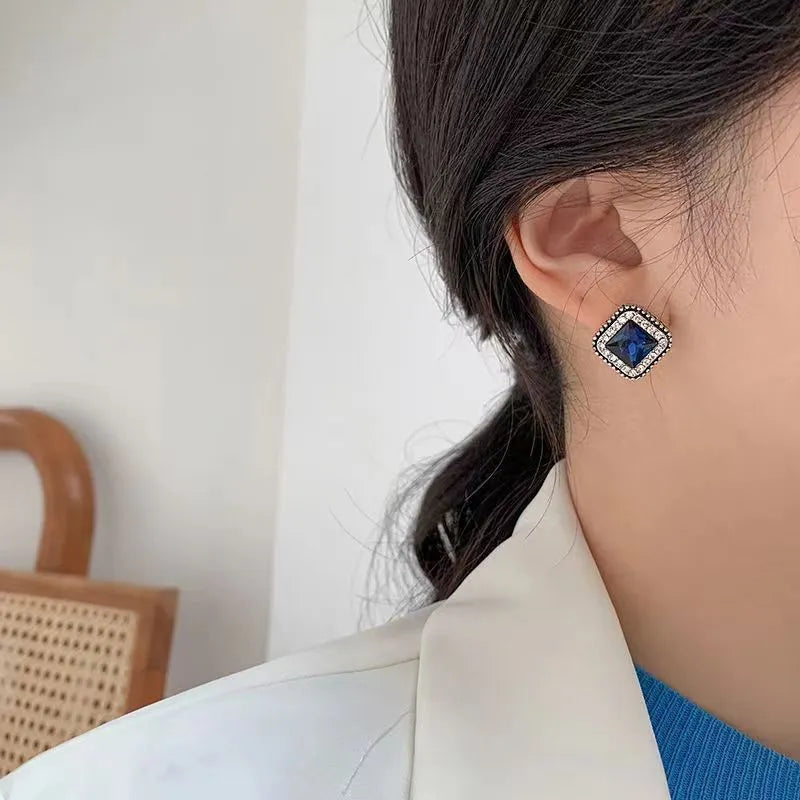 Close up of Korean blue diamond square earrings with geometric zinc alloy design for women