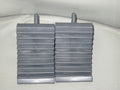 A pair of black triangular car wheel chocks for anti-slip parking safety.