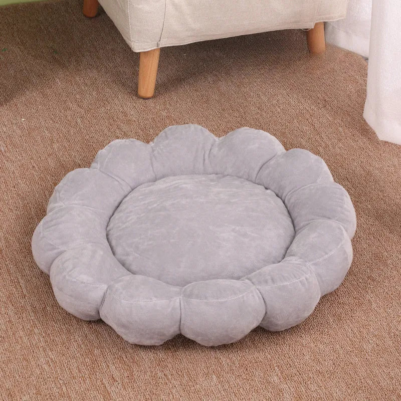 Square blue pet bed cushion with a half-surrounded side and short plush fabric