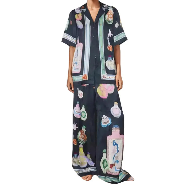 Black women's cardigan and trouser set with cartoon animation print