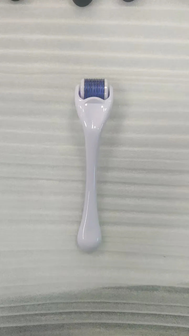 540 micro needle mechanical derma roller with black handle and coloured wheel options