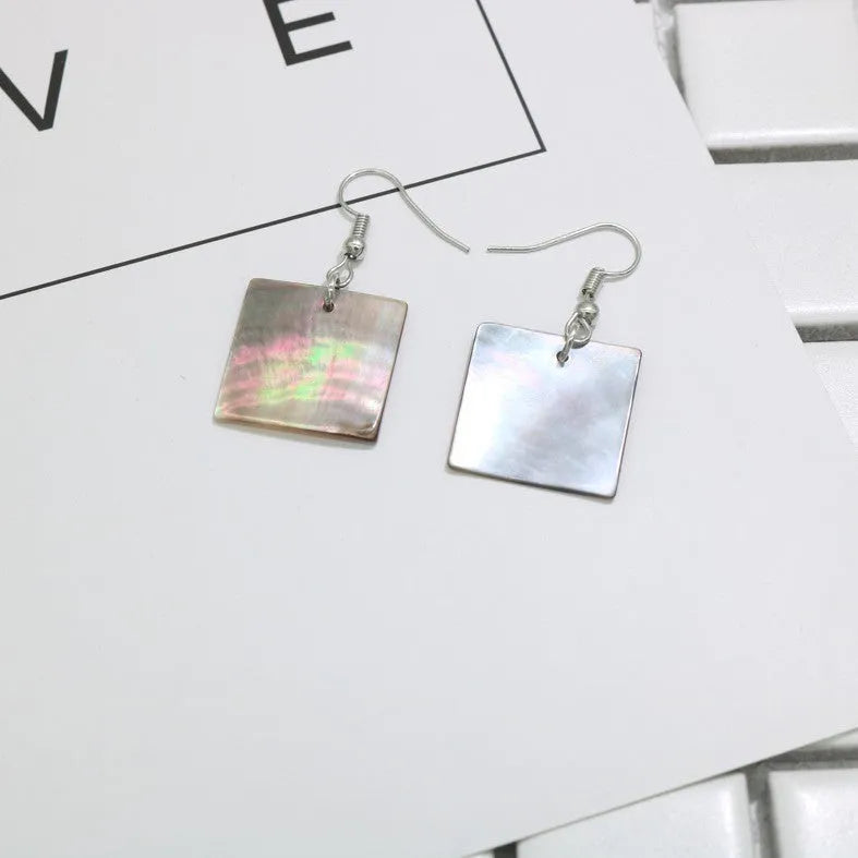 Geometric shell earrings with rectangular or square panther patterns, natural material, retro design