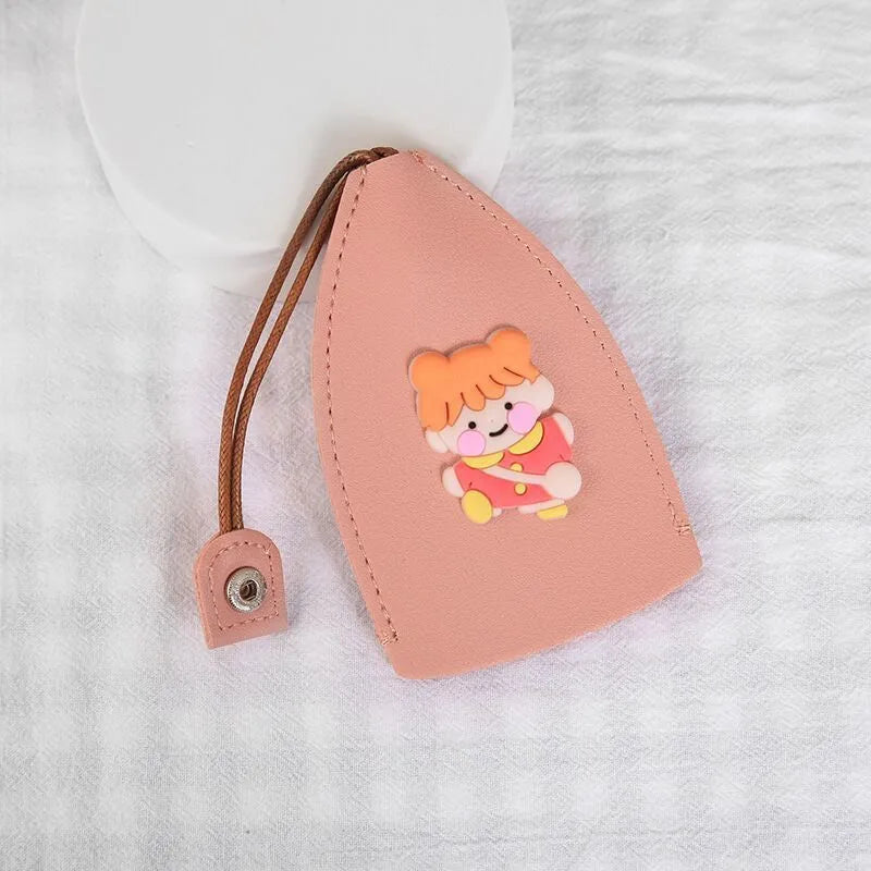 Cartoon pull-out key case in PU leather measuring 14 x 7.5 cm with colourful designs
