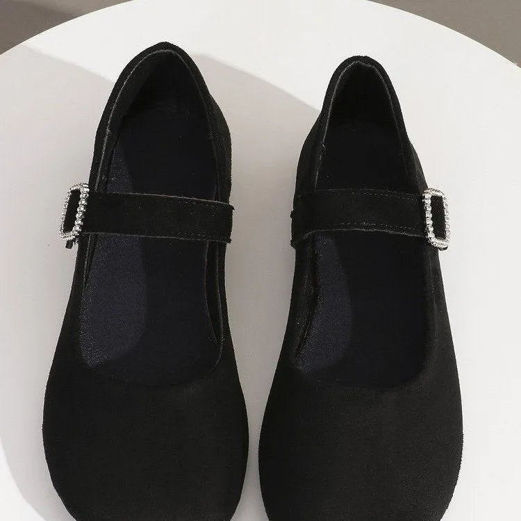 Black canvas women's flat fisherman shoes with low-top design and rubber soles