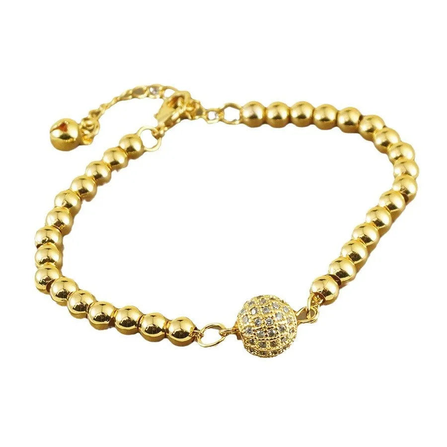 Copper heart-shaped bracelet with a single zircon stone in an Arabic style.