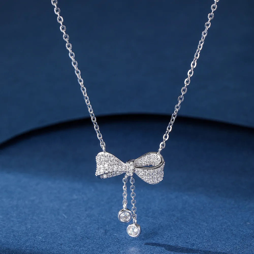 S925 sterling silver bow pendant necklace with adjustable O-ring chain for women