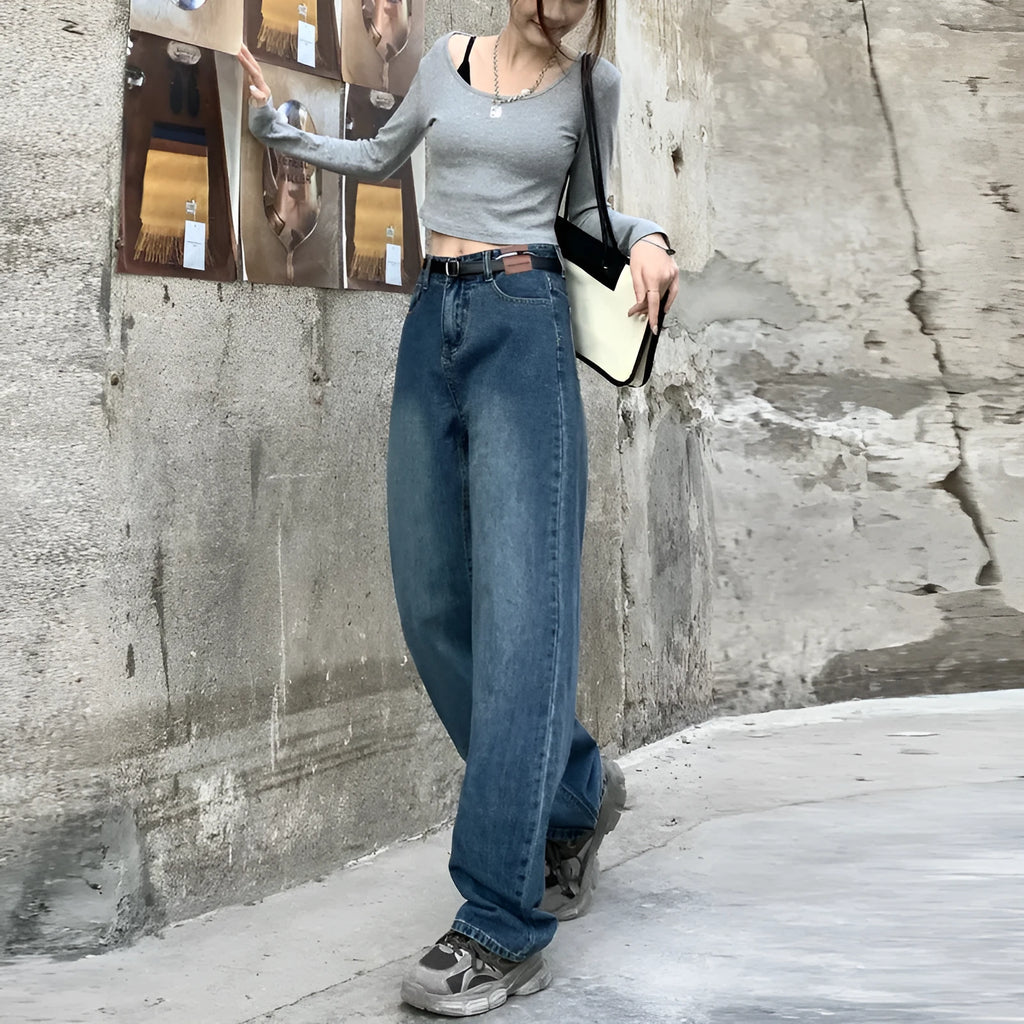 Women's retro blue high waist straight leg jeans on a hanger, showing the classic denim cut.