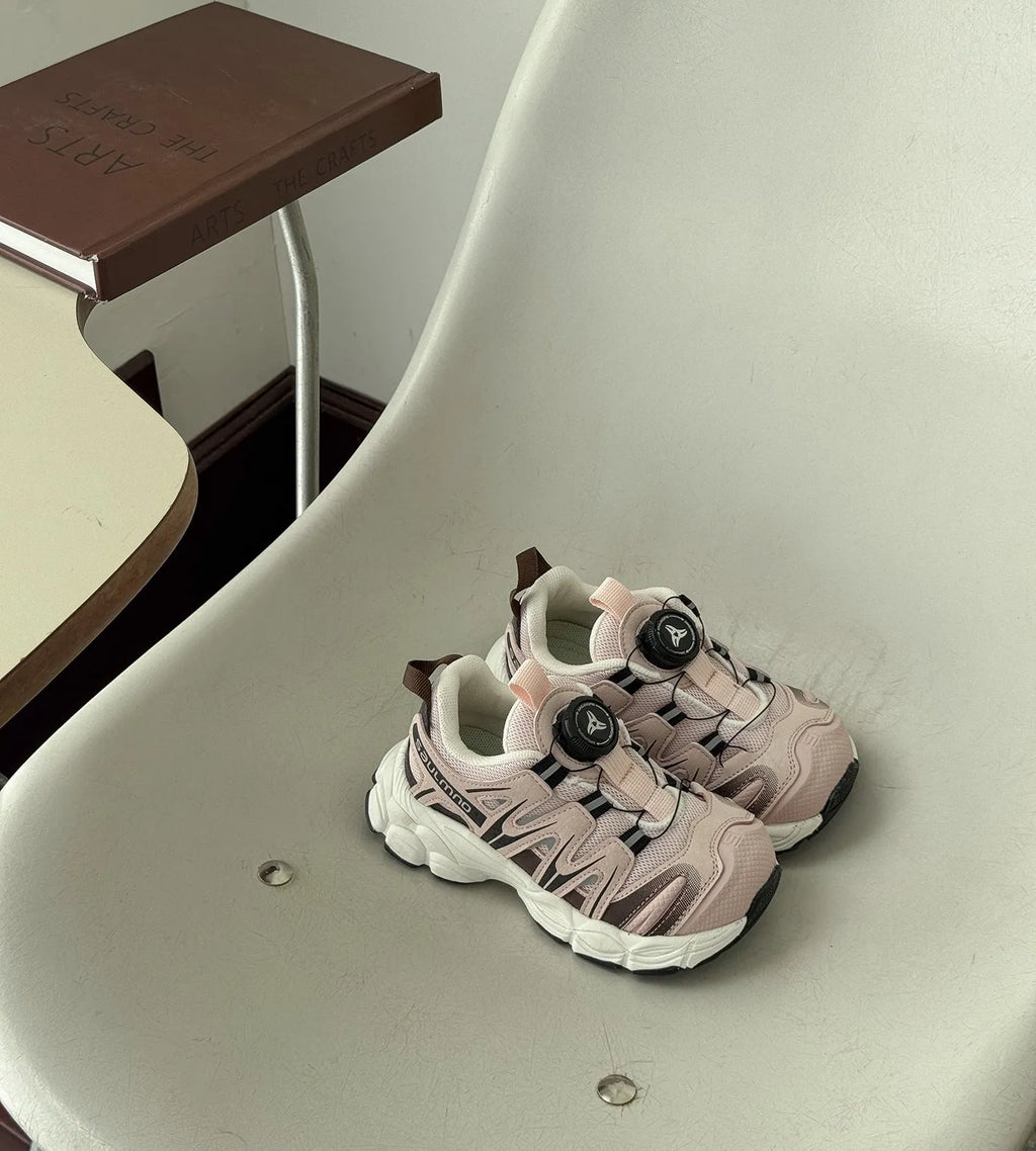 Girls' casual shoes in beige, black, or pink with a breathable PU leather mesh upper.