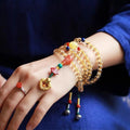 Brazilian natural citrine bracelet with 1mm yellow beads on filament cord