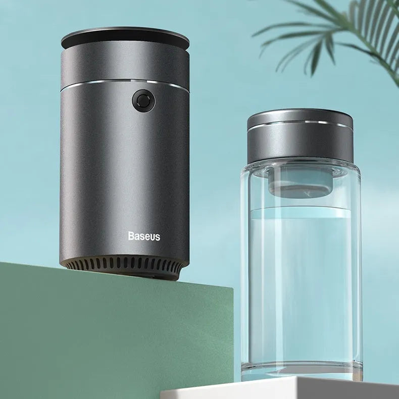 Dark gray column-shaped mini USB aromatherapy humidifier with 0.5-1L tank and single fog export.