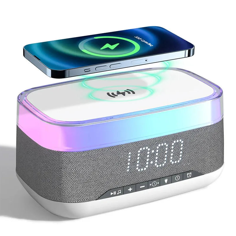 White alarm clock with wireless charging surface and Bluetooth speaker functionality for bedside use