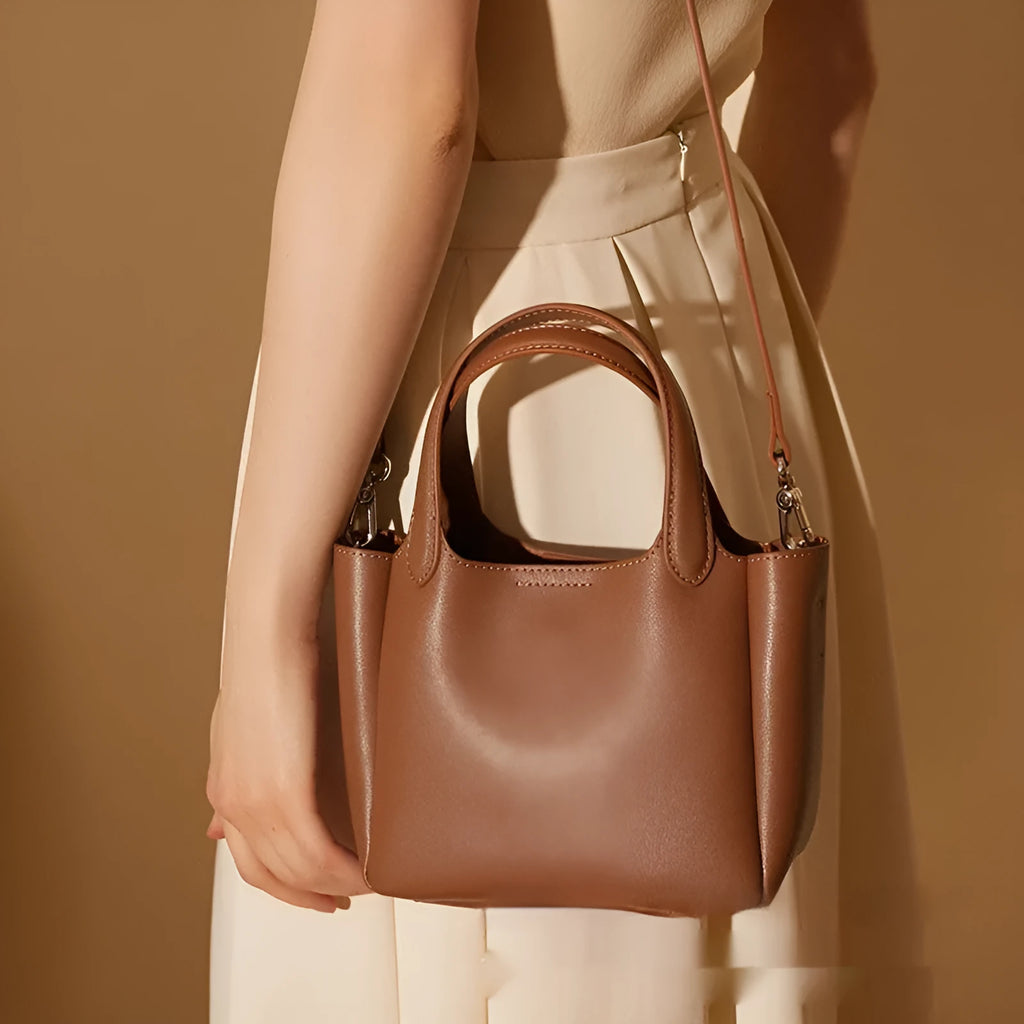 Genuine cattlehide leather cross body bucket bag in square vertical model with retro styling
