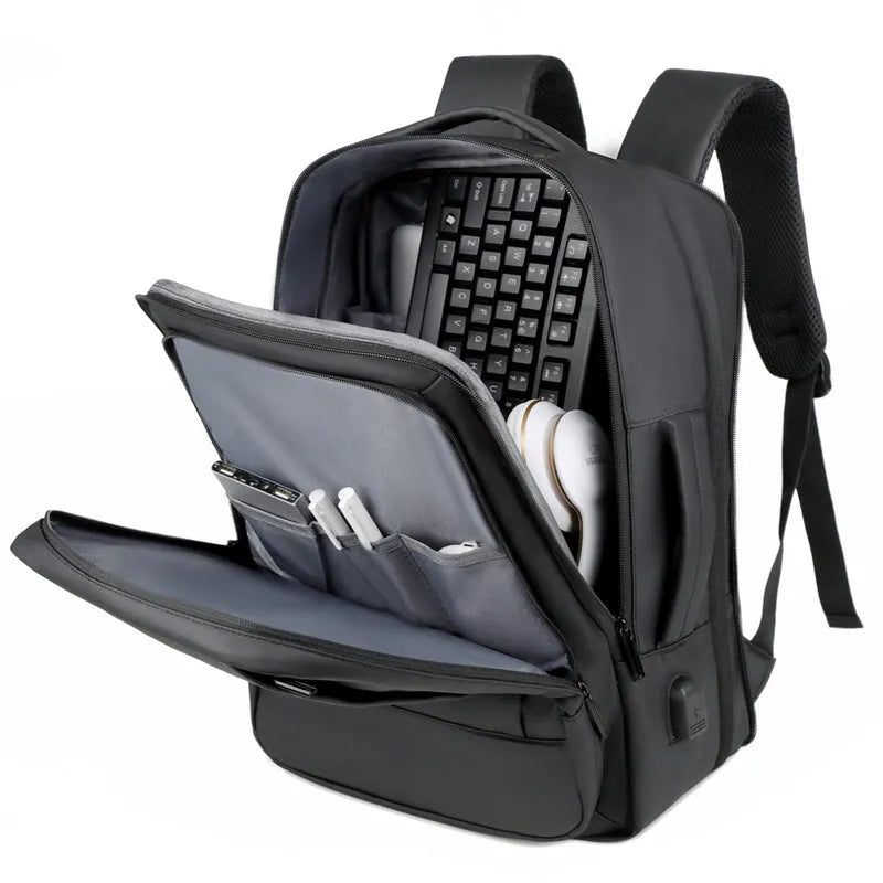 Black or grey waterproof Oxford cloth backpack with 20-35L capacity and curved shoulder straps for business travel