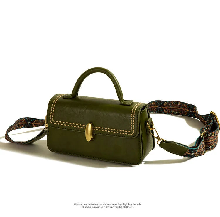 Women's textured PU messenger bag in square vertical shape with sandwich pocket and sewing thread detailing