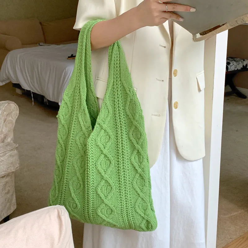 Large retro hollow knitted women's shoulder tote bag in a solid colour with double straps.