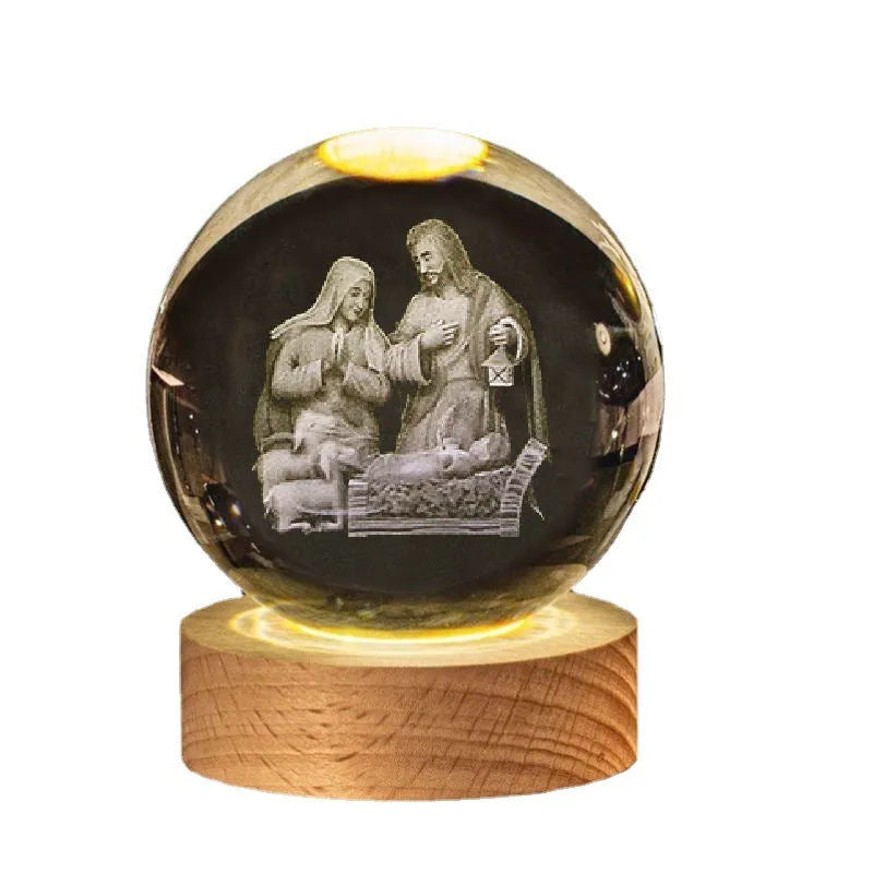 White crystal ball ornament on a wooden base with warm light, showing a detailed Cross design inside.