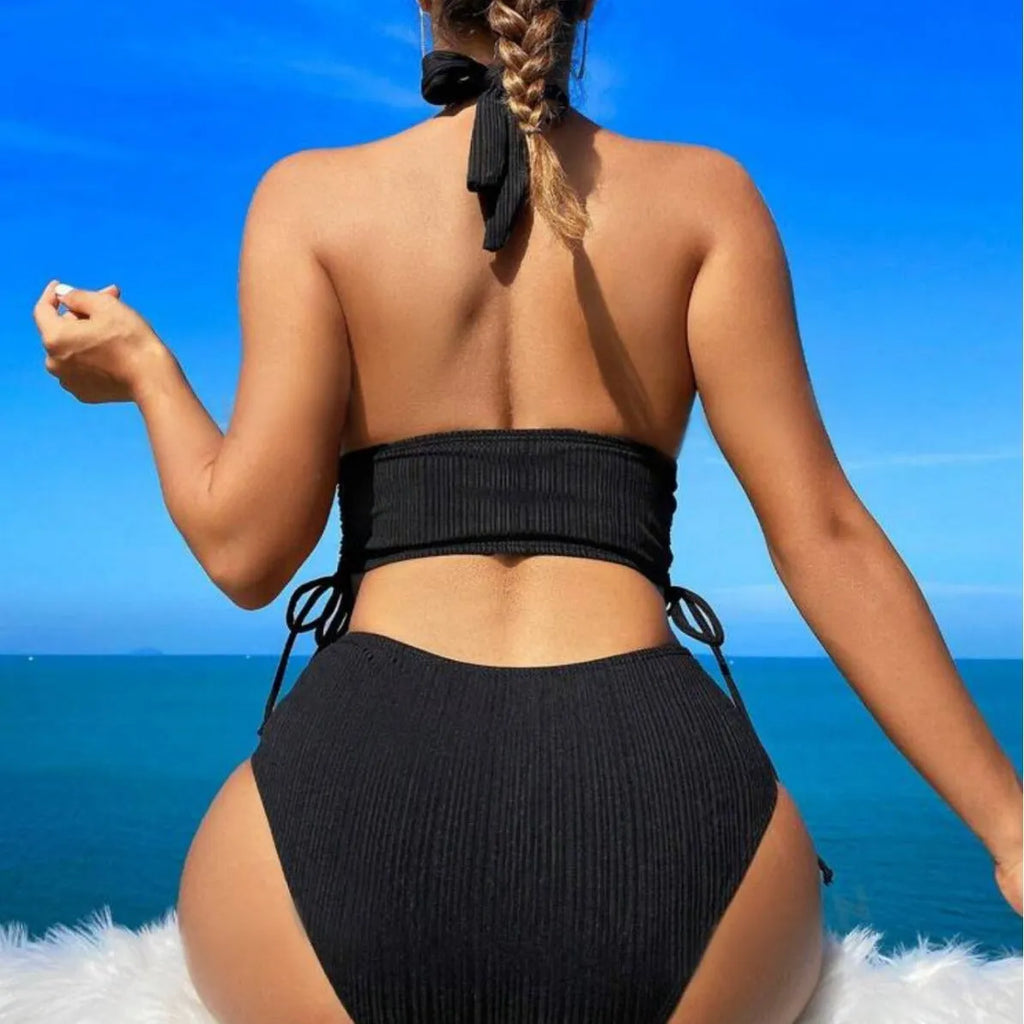 Women's black halter neck bikini set with lace-up detail on the top