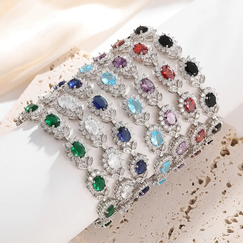 Personality Trend women's simple bracelet with inlaid zircon stones in one of nine gemstone colours on alloy band.