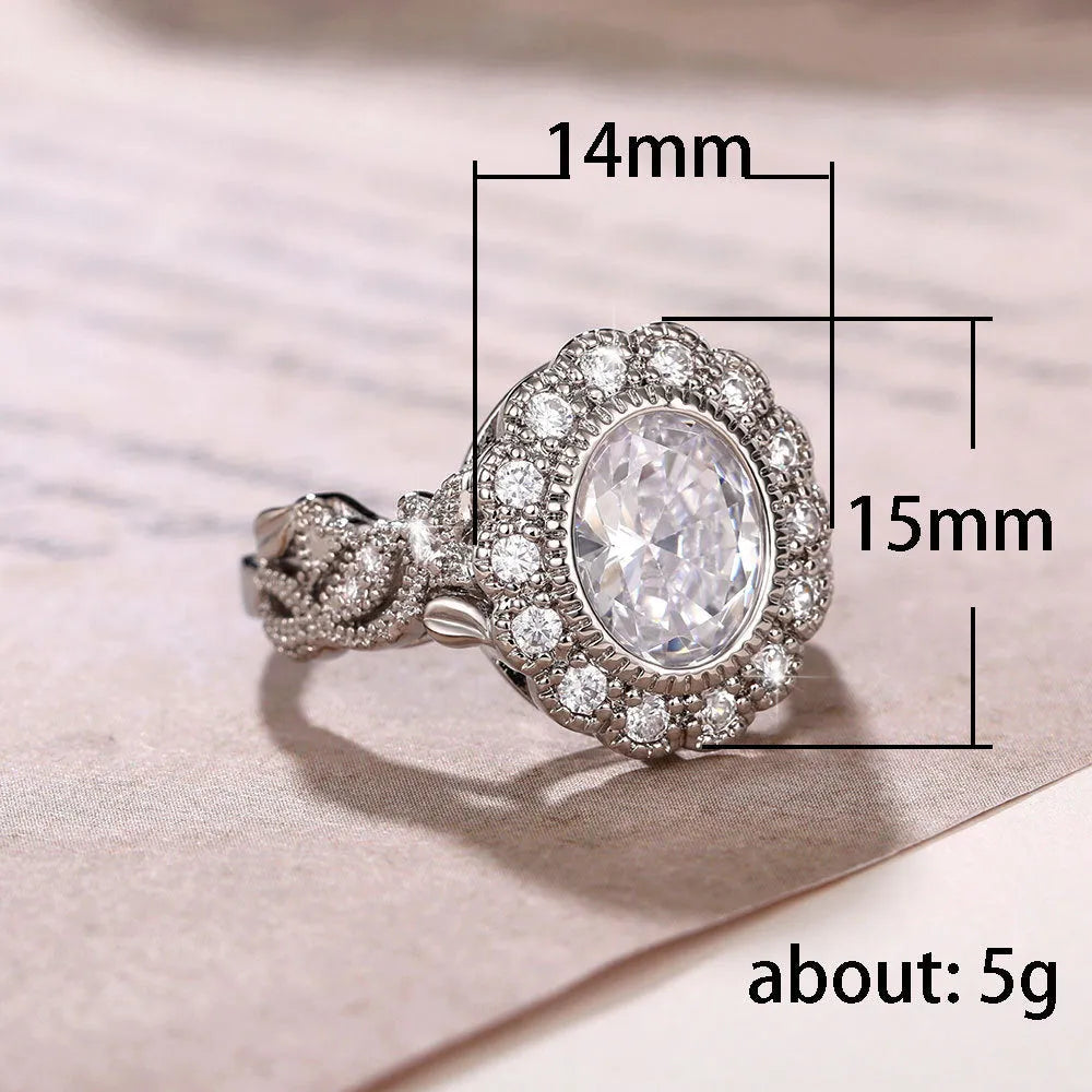 Geometric women's ring with round zircon elements in white gold colour on copper