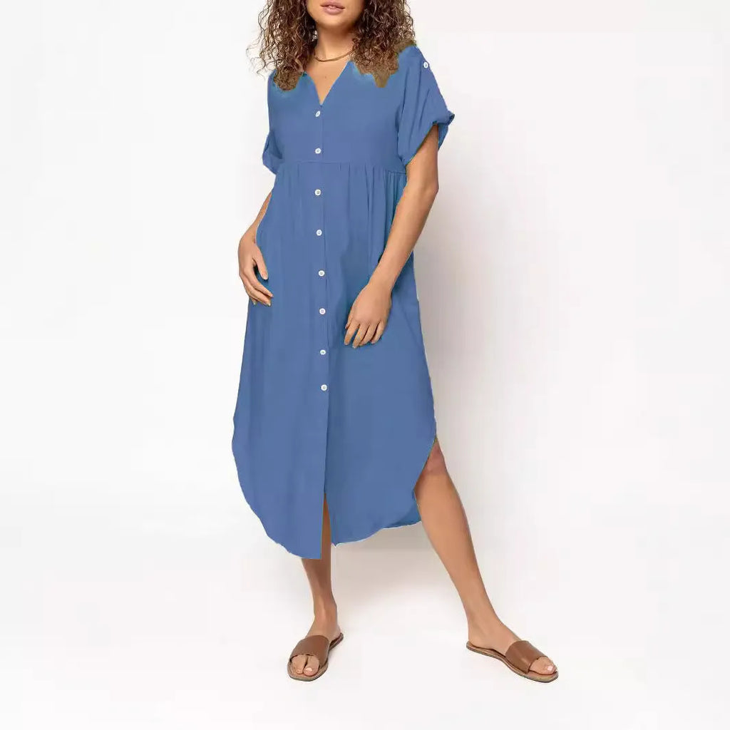 Loose fit solid colour midi dress with decorative buttons on a hanger