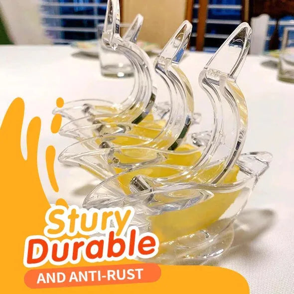Clear acrylic bird-shaped manual lemon juicer kitchen gadget on countertop