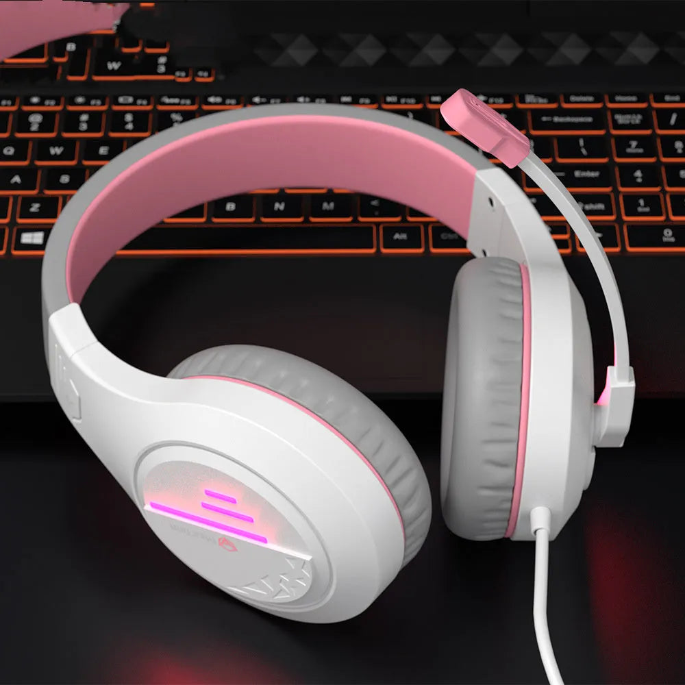 Wired gaming headset with orange and black earcups, adjustable headband, and 3.5mm cable