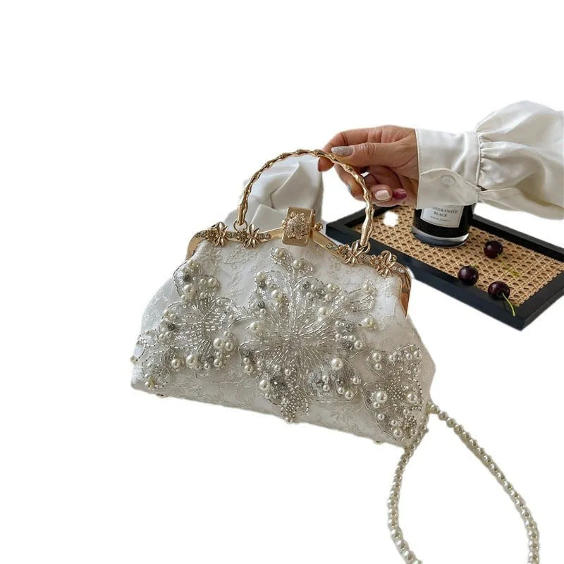 Pearl embroidered polyester handbag in horizontal square shape with double shoulder straps