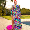 Women's printed A-line long dress with deep V-neck and split design in floral pattern