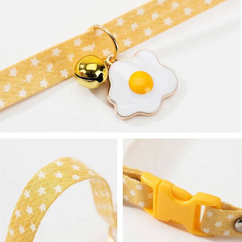 Adjustable cat collar with bell and bow tie decoration on small dog