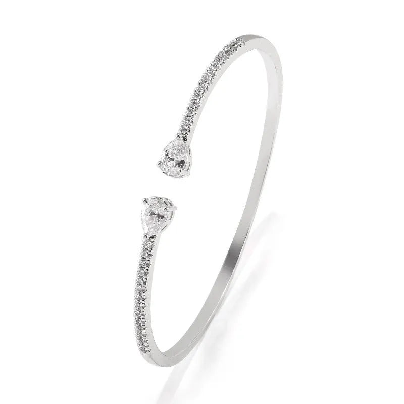 Multi-zircon personalised fashion bracelet with inlaid treatment on copper in blue and white options