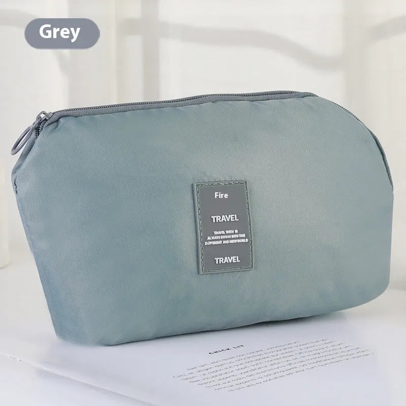 Multi-purpose polyester digital storage bag in beige with zip closure for travel and business use