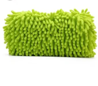 Silvery green chenille microfiber car wash sponge on a car bonnet.