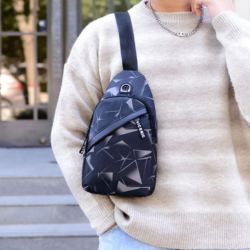 Blue Oxford cloth crossbody chest bag for men with an earphone hole and zipper.
