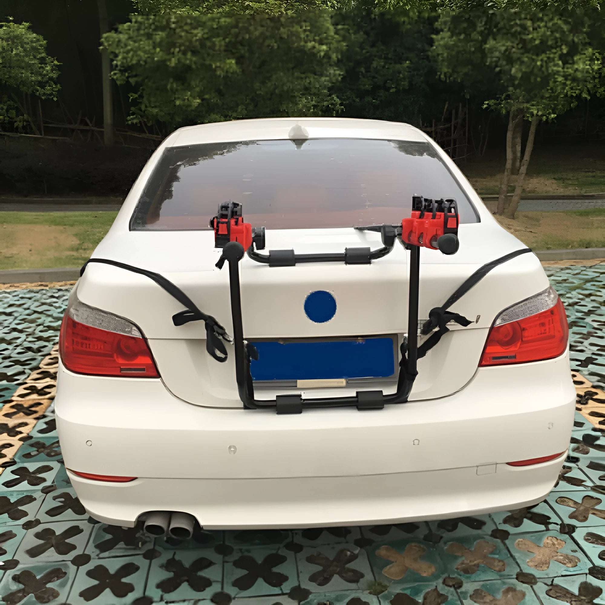 Black and red boot mounted bike holder rack with iron frame and sponge padding.