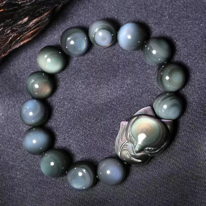 Obsidian stone bracelet with carved fox design, showing 10mm, 12mm, 14mm and 16mm bead size options