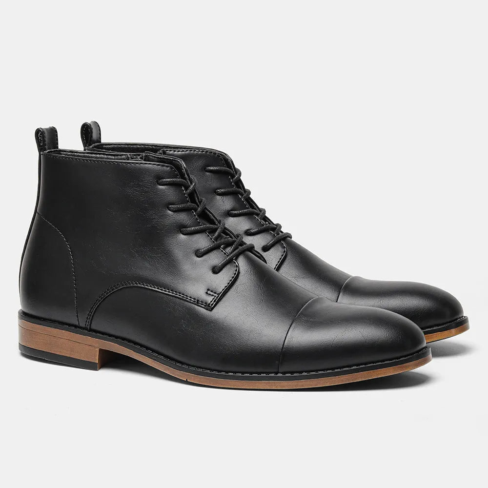Men's brown side-zip Chelsea boot with round toe and low wooden sole on a white background.