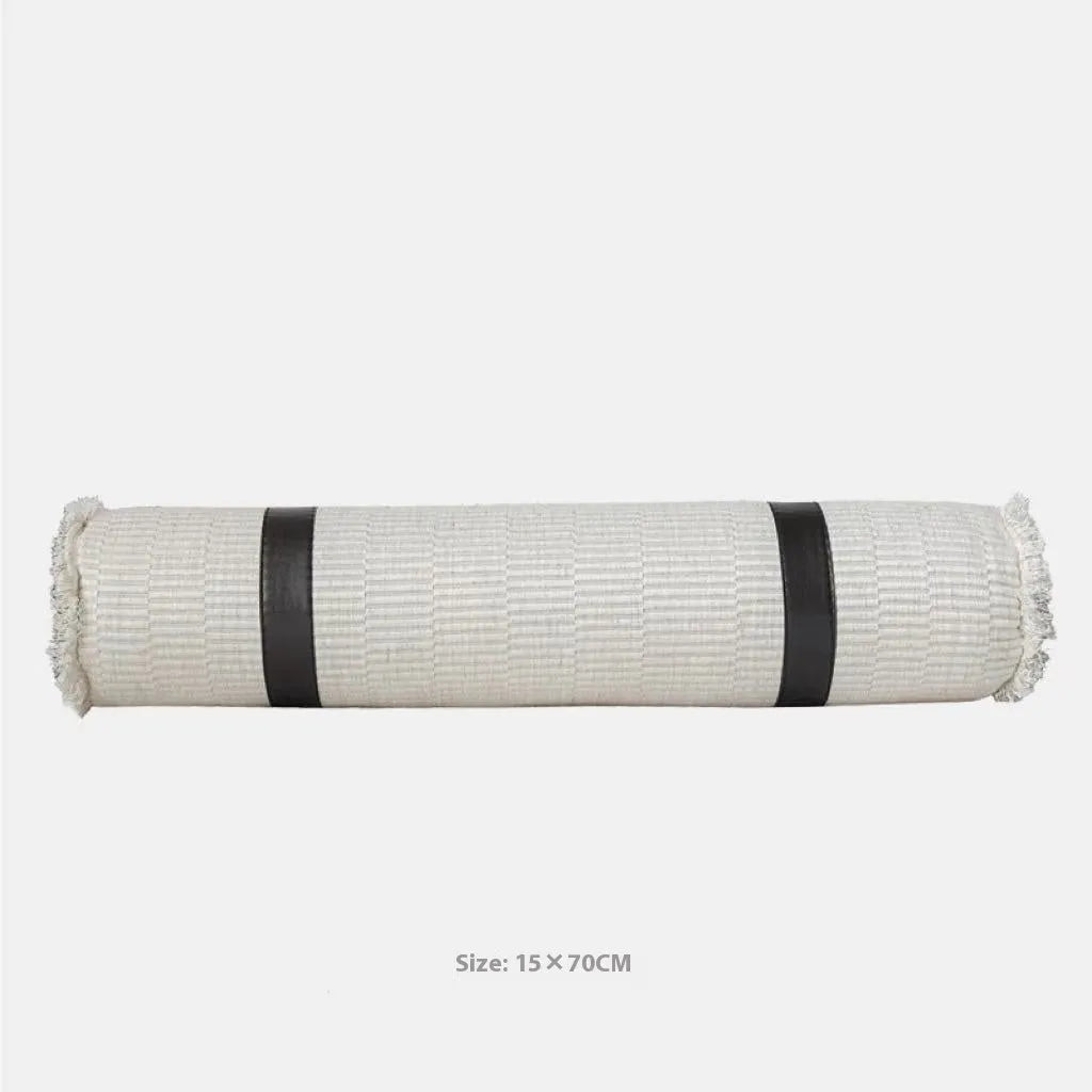 Modern minimalist grey and white plaid bed runner blanket set with pillow on a double bed.