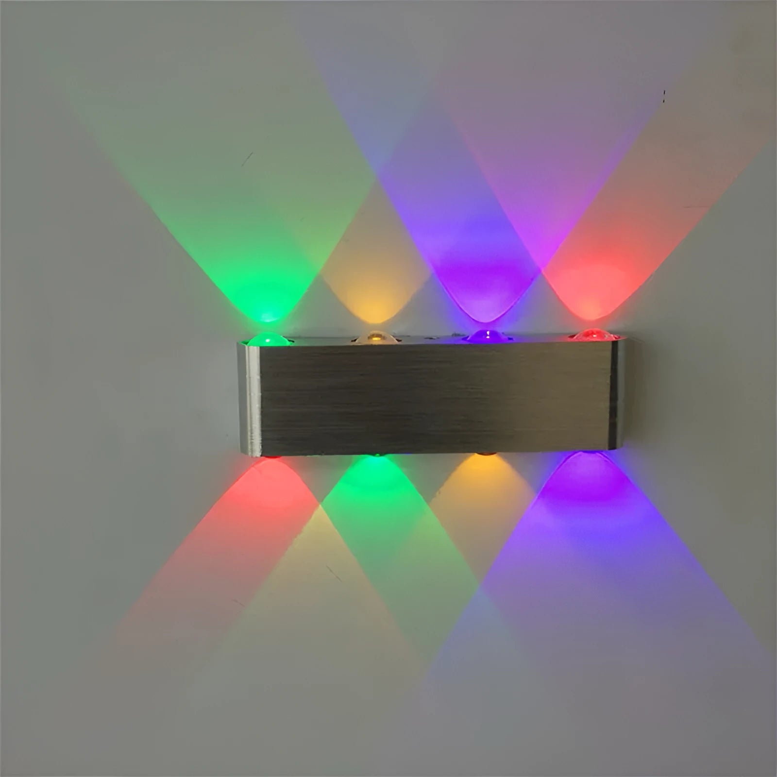 Silver aluminium rectangular LED wall lamp mounted on a wall displaying multiple colour options