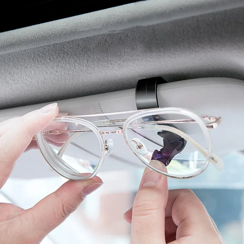 Black plastic car sun visor clip for glasses and cards measuring 6.5cm long