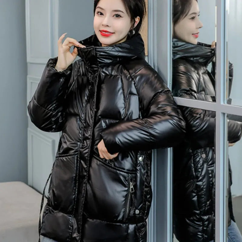 A women's loose-fit hooded winter jacket in a polyester blend, available in black, blue, green, and champagne.