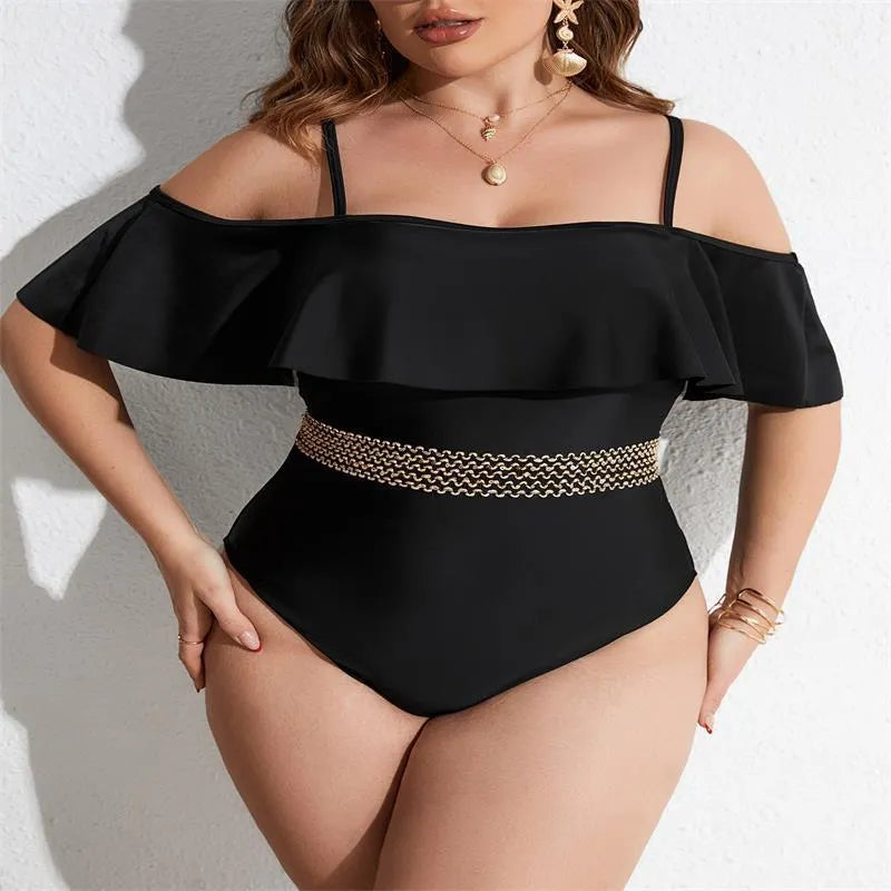 Black solid colour women's one-piece swimsuit on a hanger, polyester fabric, for swimming.