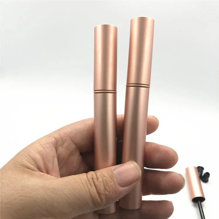 Aluminum tube 4ml cosmetic bottle with spray rose gold paint finish and black inner plug