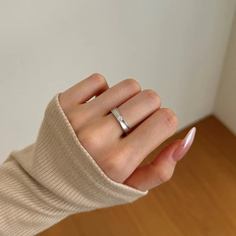 Women's silver ring with geometric hexagon and octagon arc design and zircon inlay in electroplated platinum finish