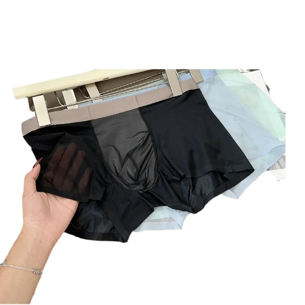 Ultra-thin seamless men's ice silk boxers with a honeycomb crotch panel, shown in multiple colours.