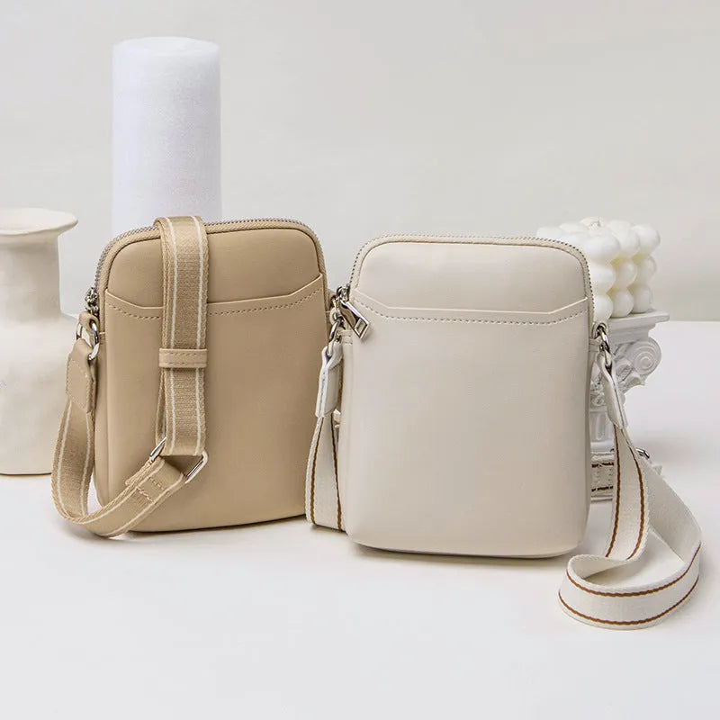 Small solid colour PU leather crossbody shoulder bag for mobile phone in beige.