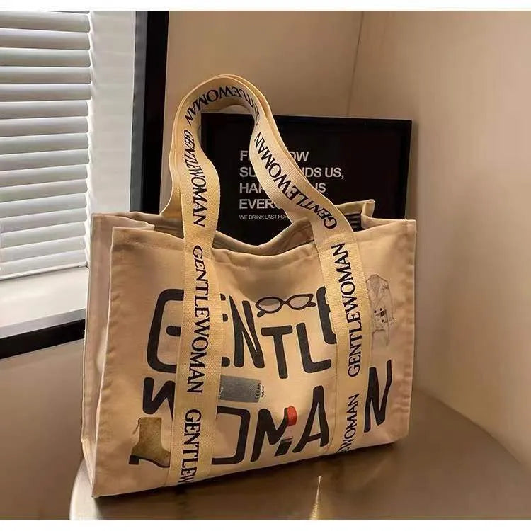 Canvas shoulder tote bag with printed design, large capacity for shopping and travel