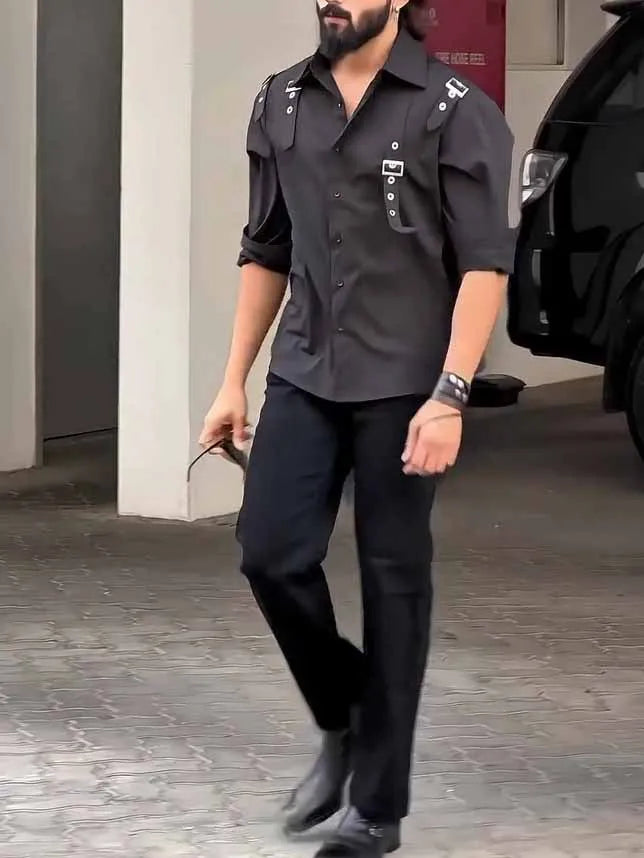 Men's black long-sleeve button-up shirt with a regular fit on a hanger.
