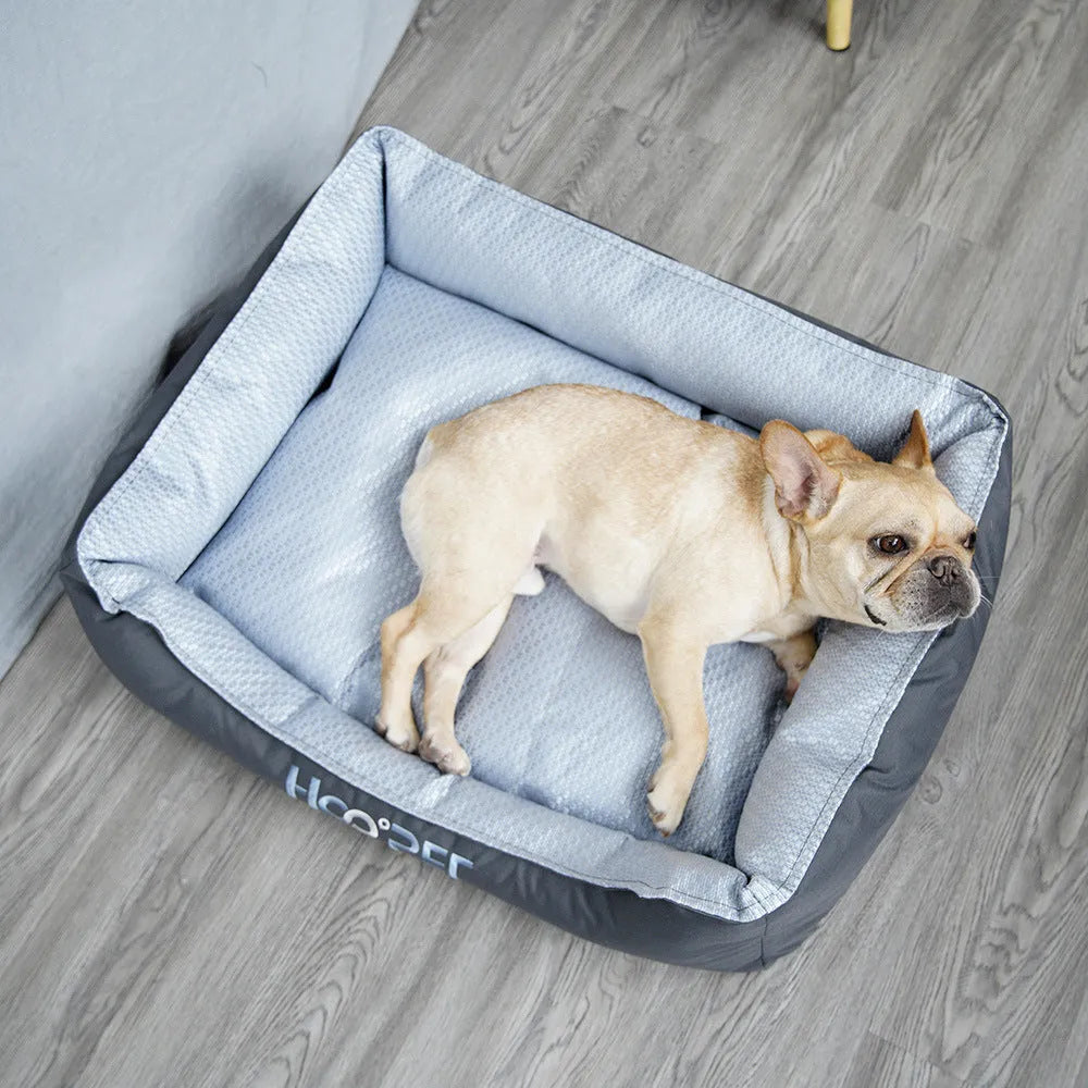 Soft grey pet bed with removable cover in small, medium, and large sizes for dogs and cats.